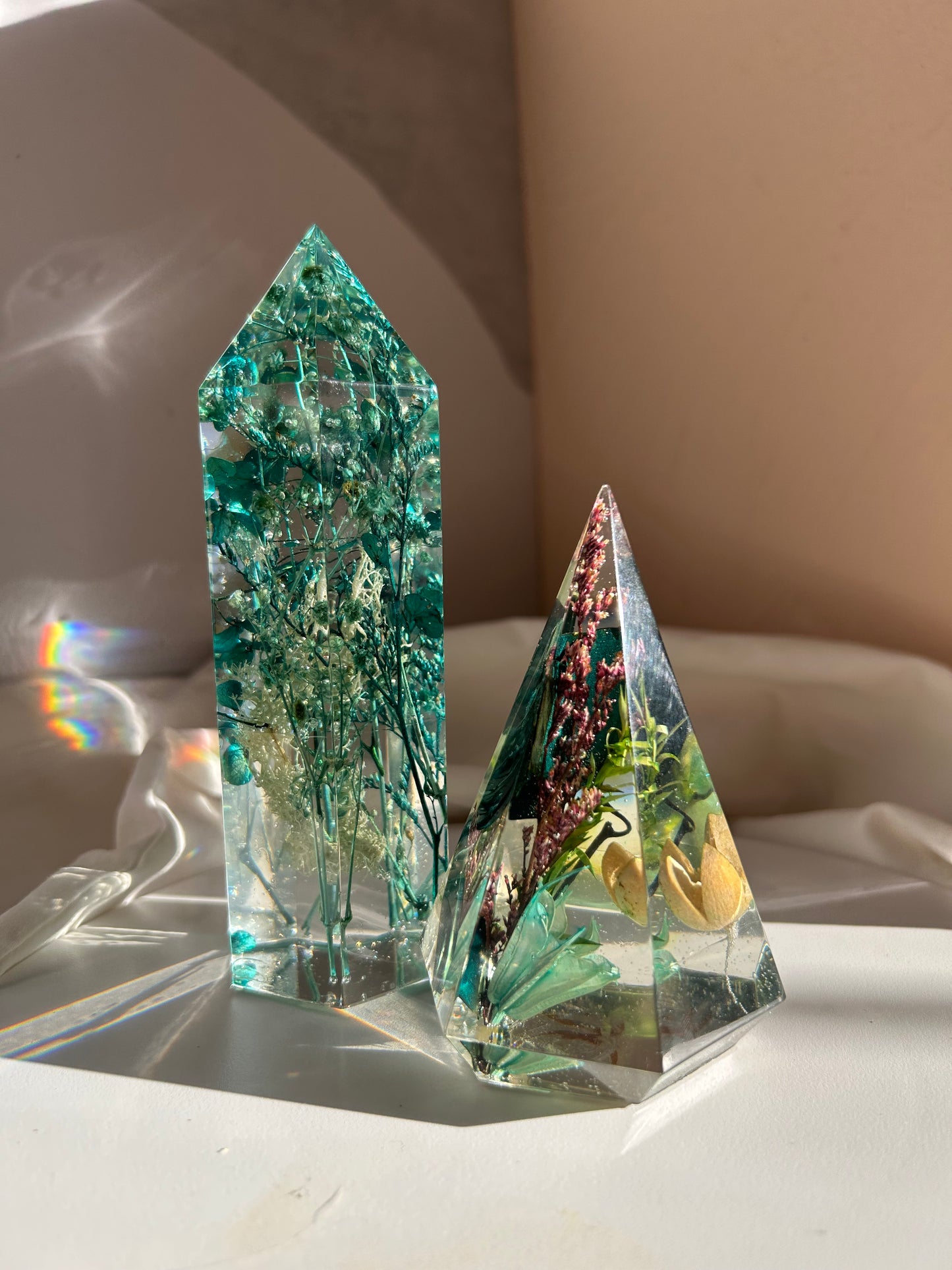 a beautiful handmade resin ring tree ring cone featuring floral dried botanicals. perfect for displaying rings, a unique botanical gift. beautiful vanity, bedroom, bathroom, office, tabletop, nightstand decor. Great as a unique gift for a loved one.