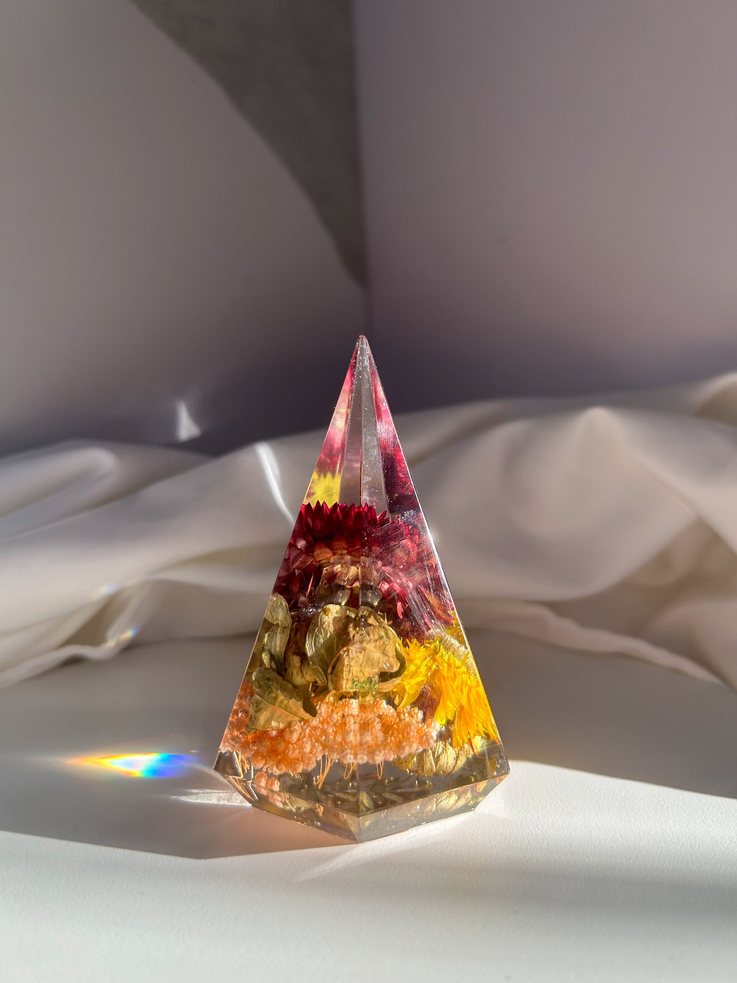 A beautiful colorful rainbow crystal resin ring tree ring cone ring holder. Features beautiful pink purple orange yellow and green wildflower that perfectly organizes your rings while decorating any area great gift for Mother's day Christmas birthday