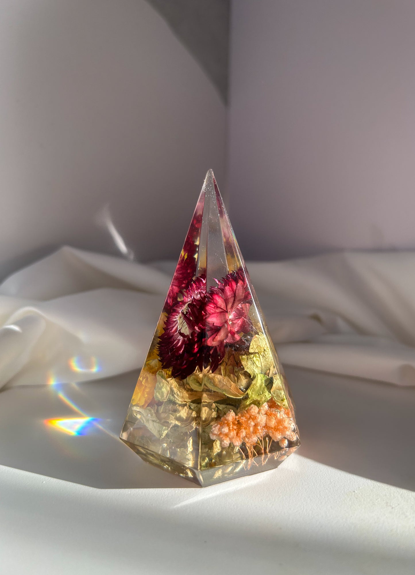 A beautiful colorful rainbow crystal resin ring tree ring cone ring holder. Features beautiful pink purple orange yellow and green wildflower that perfectly organizes your rings while decorating any area great gift for Mother's day Christmas birthday