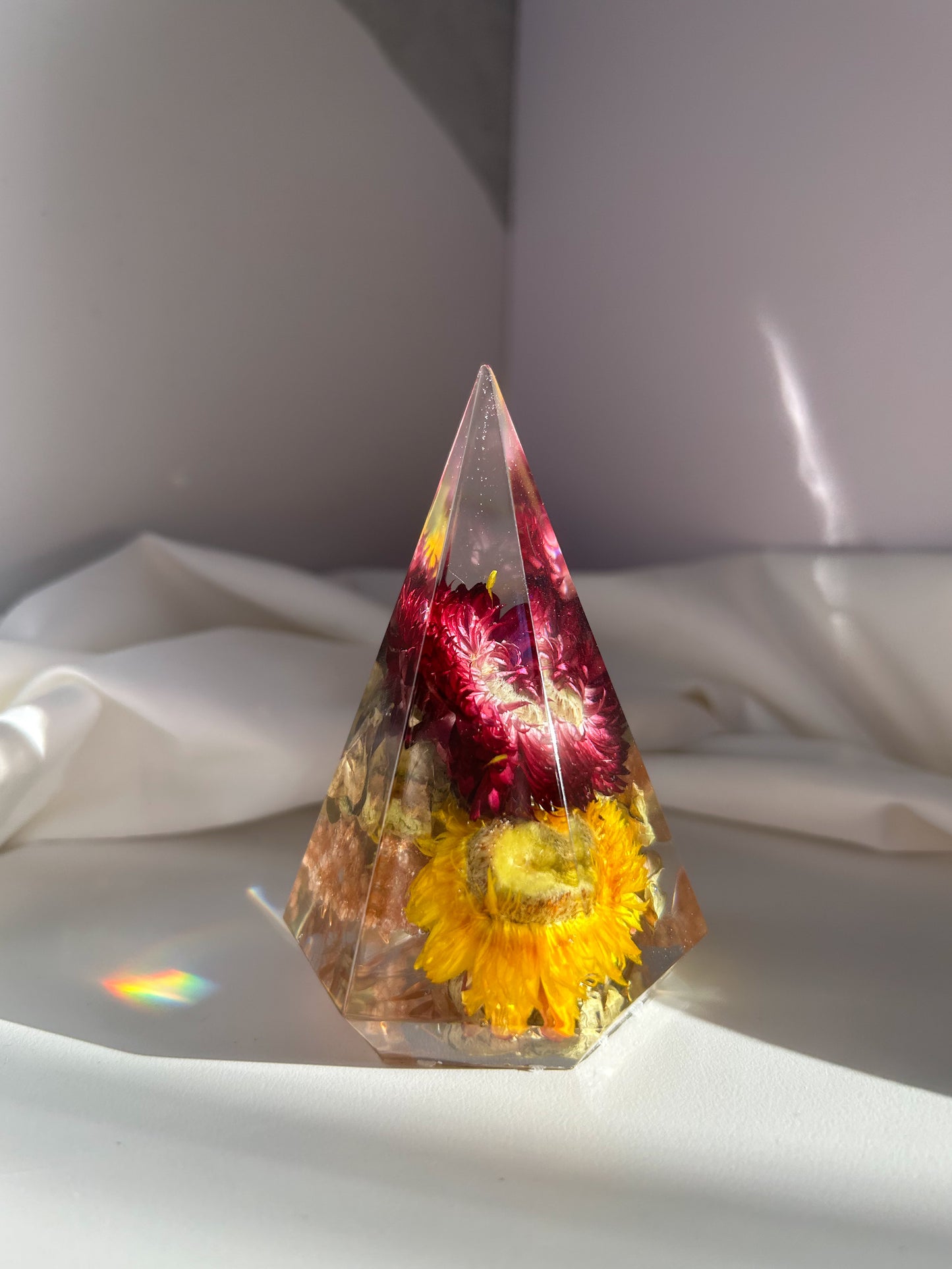 A beautiful colorful rainbow crystal resin ring tree ring cone ring holder. Features beautiful pink purple orange yellow and green wildflower that perfectly organizes your rings while decorating any area great gift for Mother's day Christmas birthday