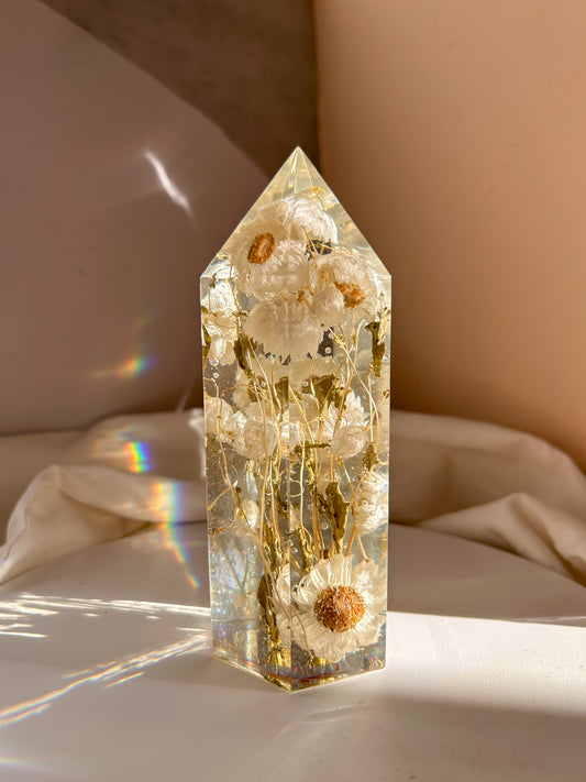 Handmade resin crystal tower featuring a real preserved dried flower daisy, captured in clear resin for a timeless look. Great for home decor, gifts, unique presents, vanity bedroom decor and shelf decor.