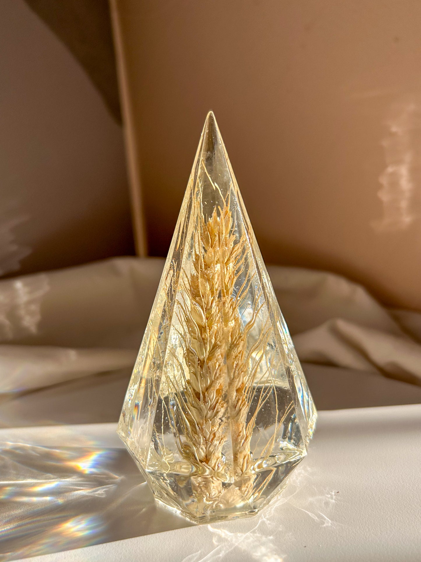 a beautiful handmade resin ring tree featuring wheat. perfect for displaying rings, a unique botanical gift. beautiful vanity, bedroom, bathroom, office, tabletop, nightstand decor. Great as a unique gift for a loved one.