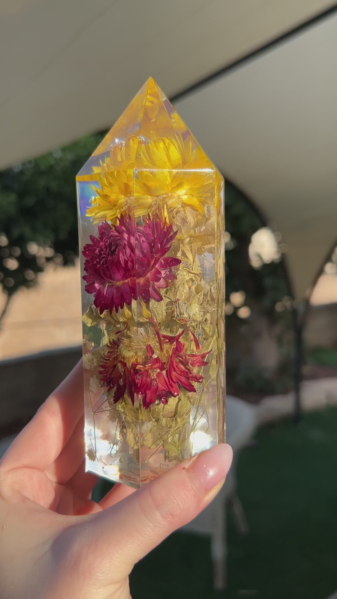 Handmade resin crystal tower featuring a real preserved colorful yellow orange purple pink green flowers, captured in clear resin for a timeless look. Great for home decor, gifts, unique presents, vanity bedroom decor and shelf decor.